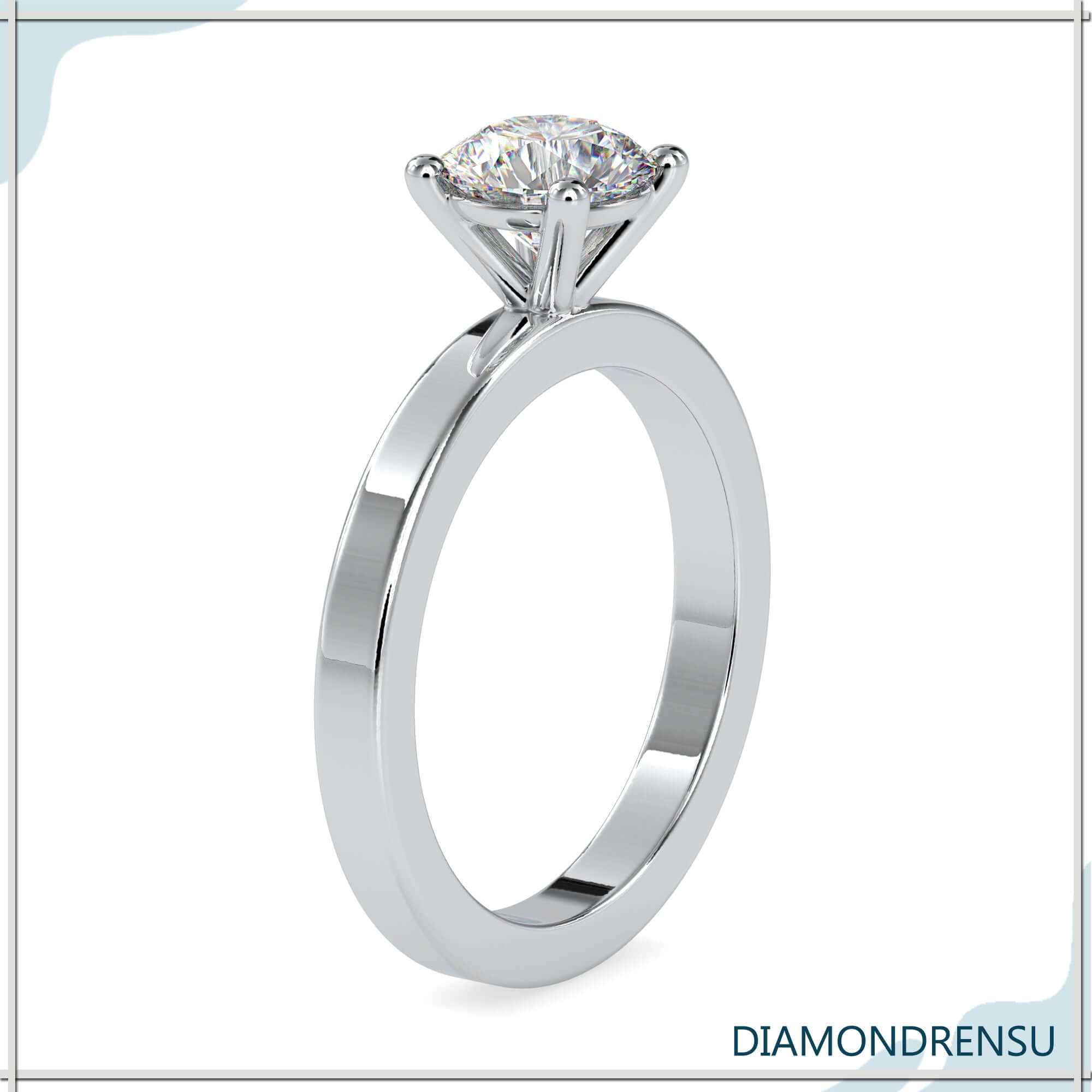 Handcrafted handmade ring with a round solitaire diamond in a basket setting.