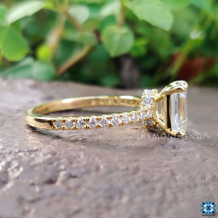 Four prong setting ring with hidden halo design.

