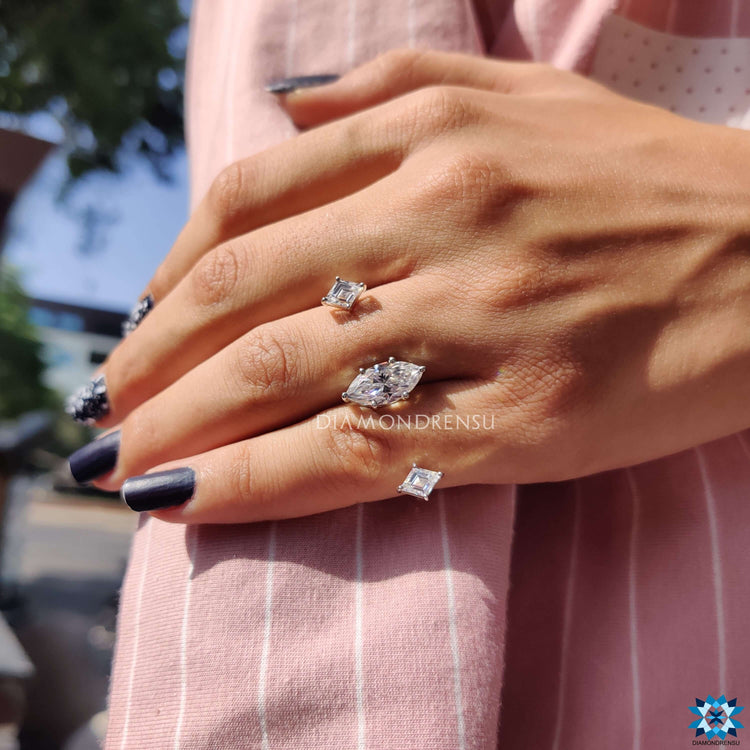 Buy custom two finger moissanite engagement ring online.
