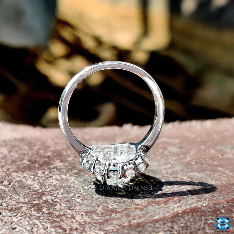 Handmade moissanite ring in white gold.
