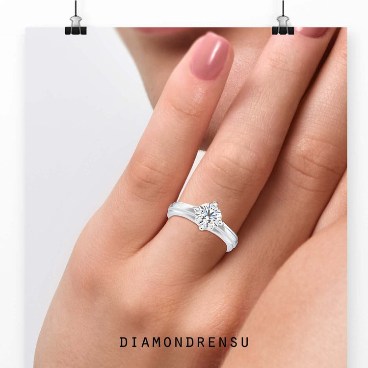 Round cut diamond solitaire setting ring in elegant rose gold.
