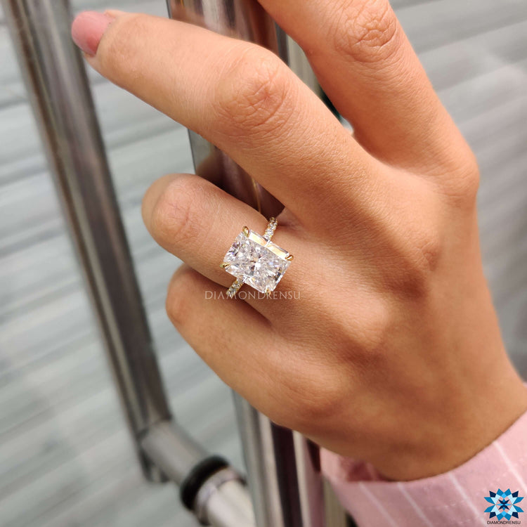 Pave setting moissanite ring with hidden halo detail.
