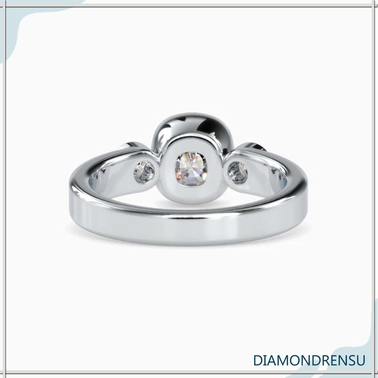 Cushion cut diamond ring in rose gold handmade setting.
