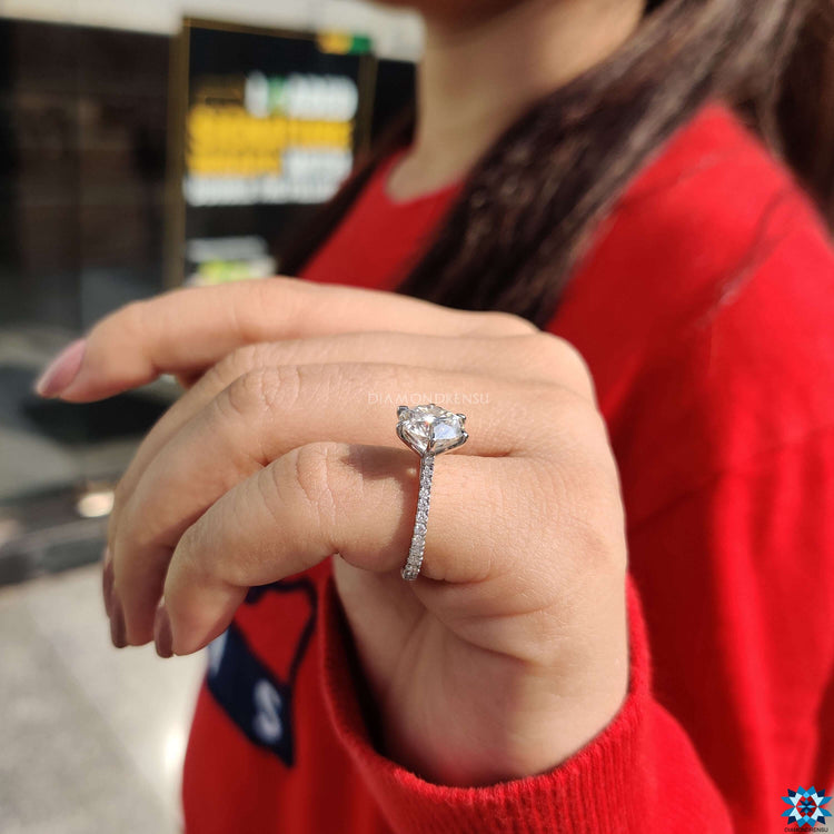 Elegant white gold moissanite engagement ring.
