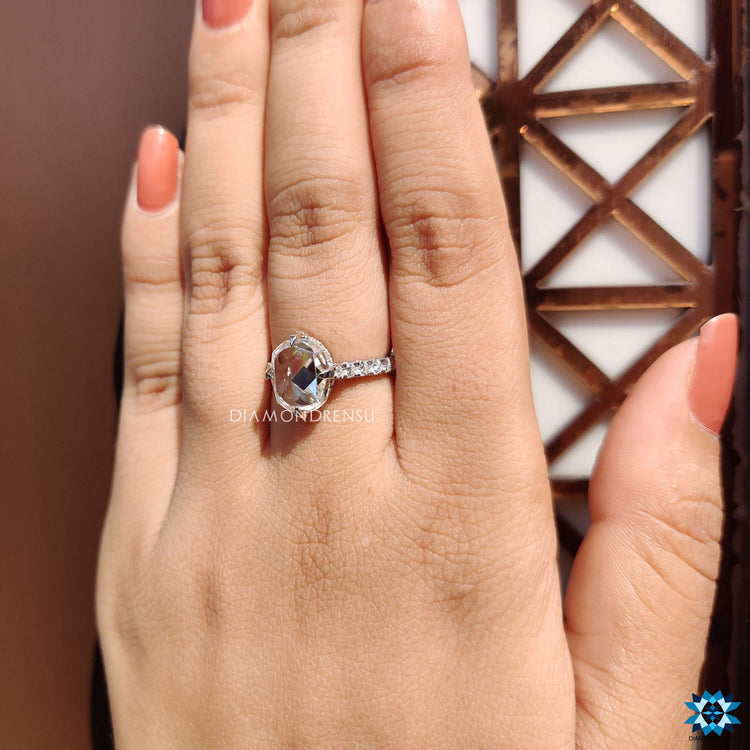 Diamondrensu UK cushion moissanite hidden halo engagement ring.
