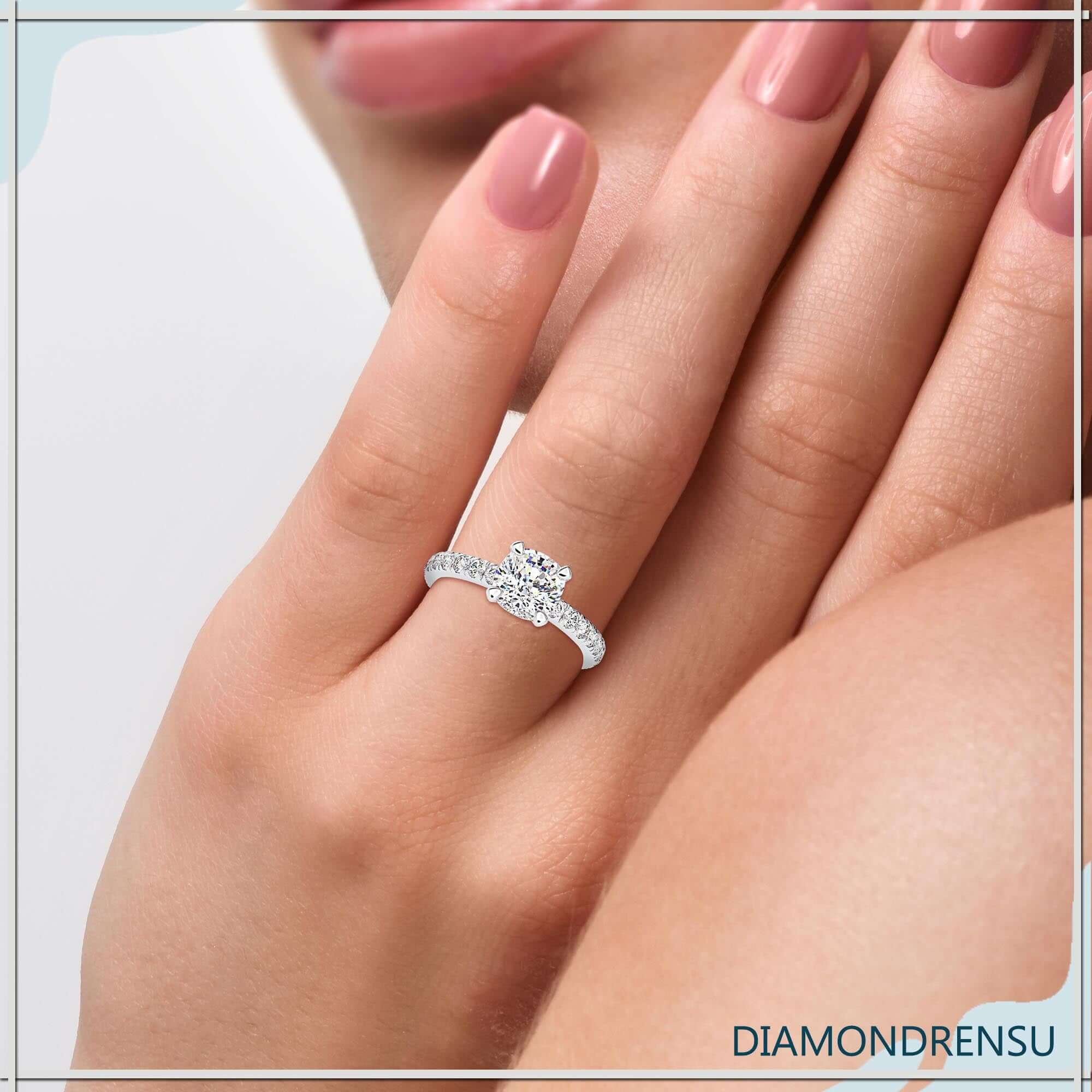 Stunning cushion diamond engagement ring with 2ct cushion cut diamond and pave setting.
