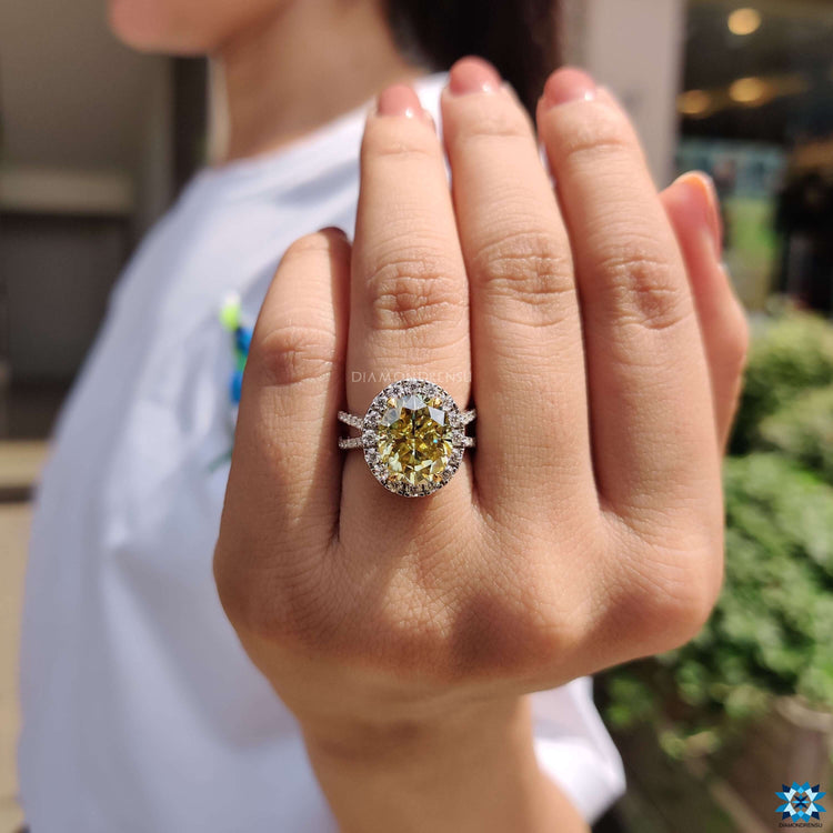 Canary yellow moissanite ring in halo setting.
