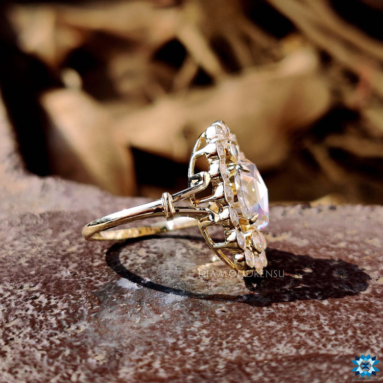 Custom engagement ring with oval rose cut moissanite.

