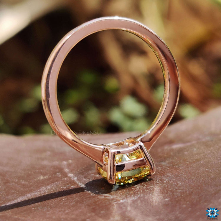Custom engagement ring with yellow moissanite.
