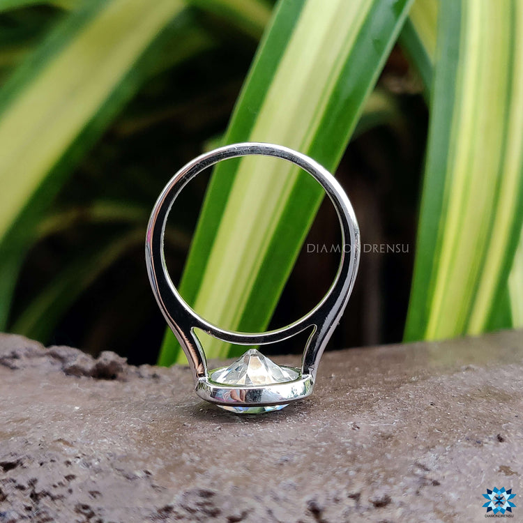 Custom engagement ring featuring Old European cut stone.
