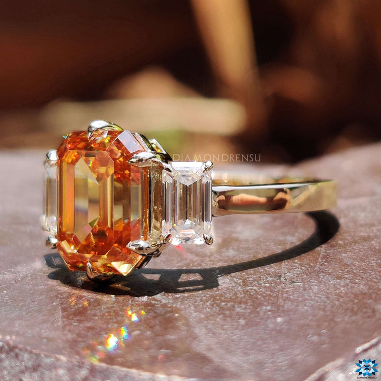 Custom-made moissanite ring in emerald cut.
