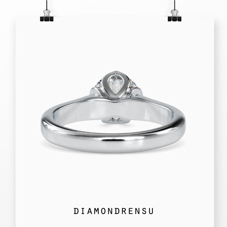 UK diamond ring with tulip style and handmade detail.

