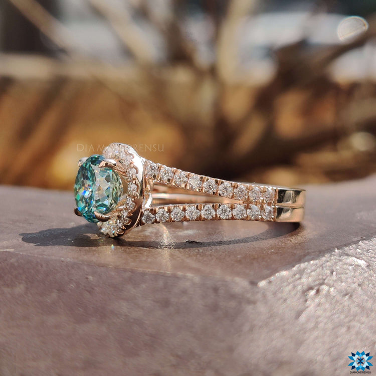 Split pave set band with round center stone.
