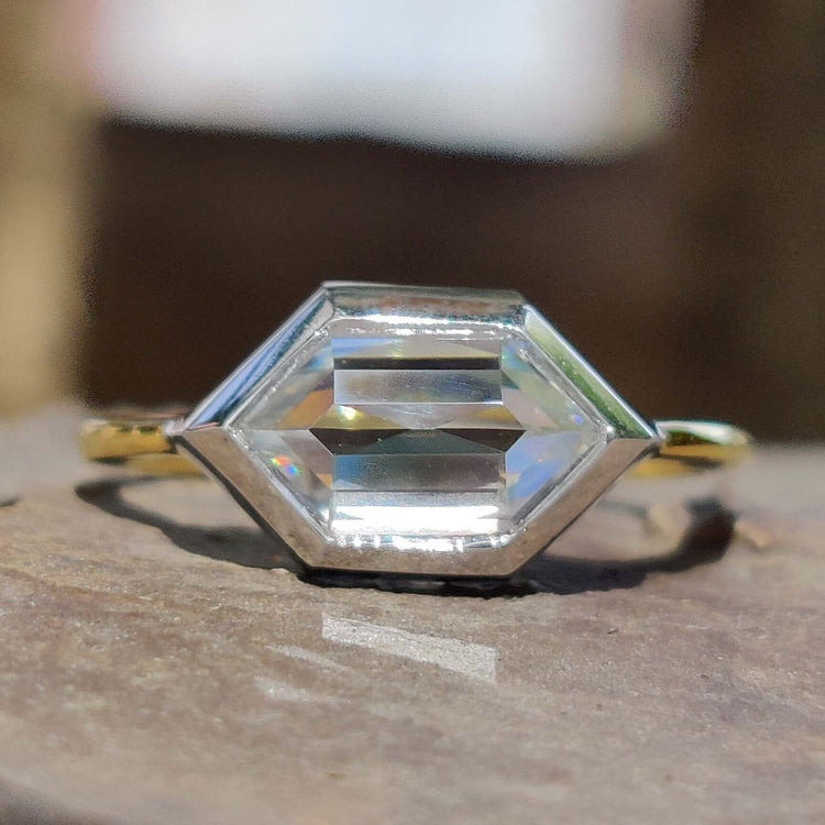 Hexagon rose cut moissanite engagement ring in two-tone gold.
