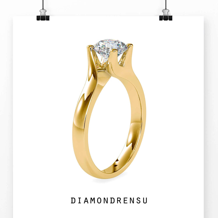 Bypass solitaire ring with round cut lab diamond.

