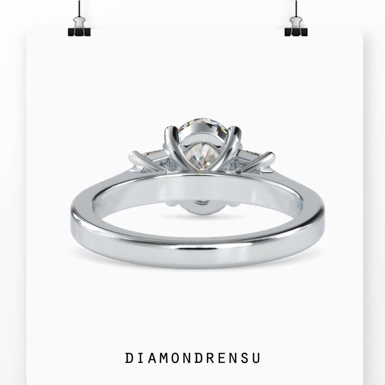 Prong setting ring featuring lab grown oval centre diamond.
