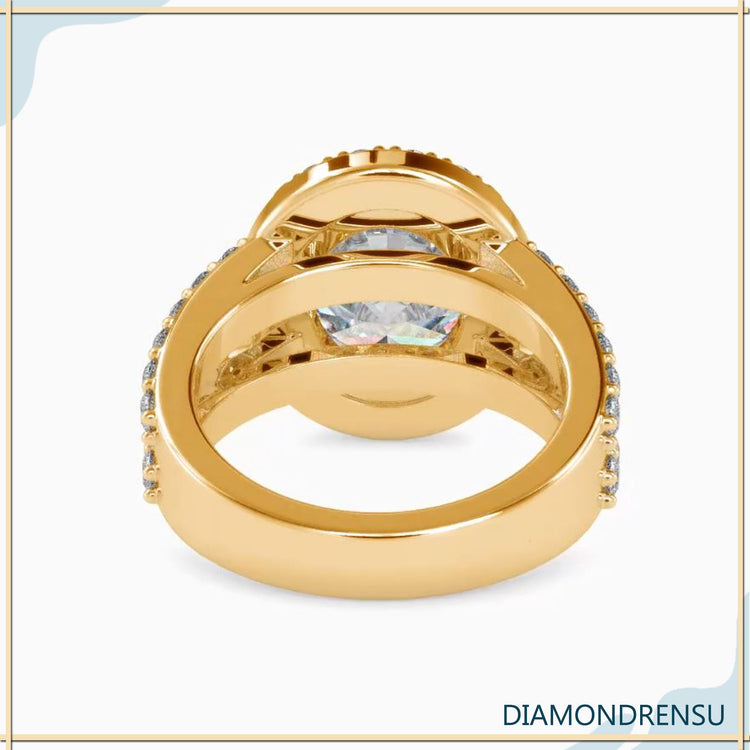 Lab diamond ring with 4 prong oval setting and pave band.