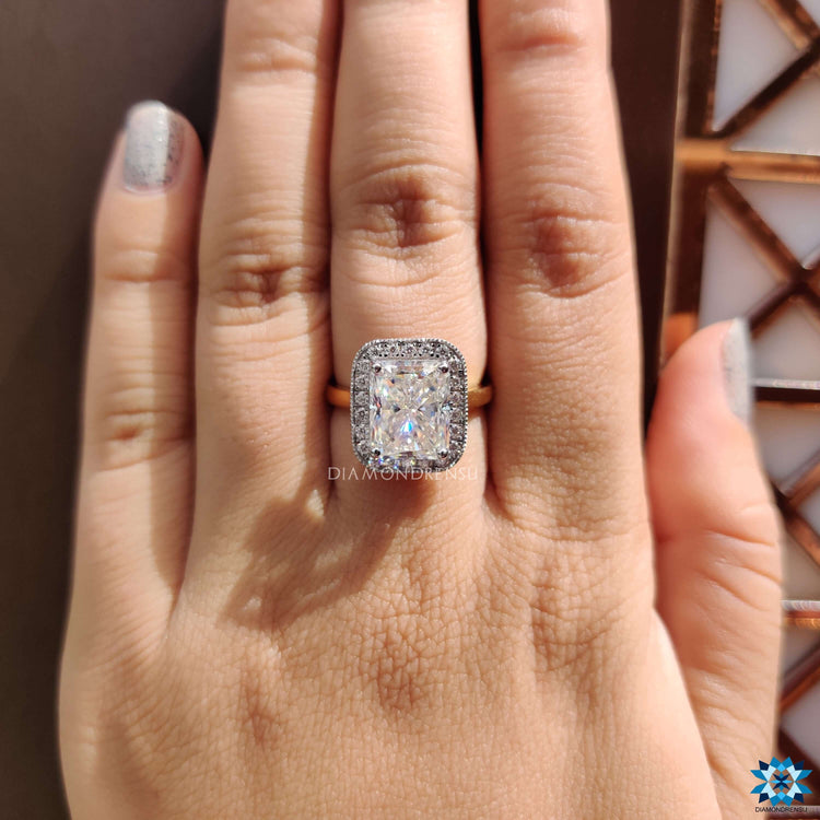 Handmade radiant moissanite ring in prong setting.
