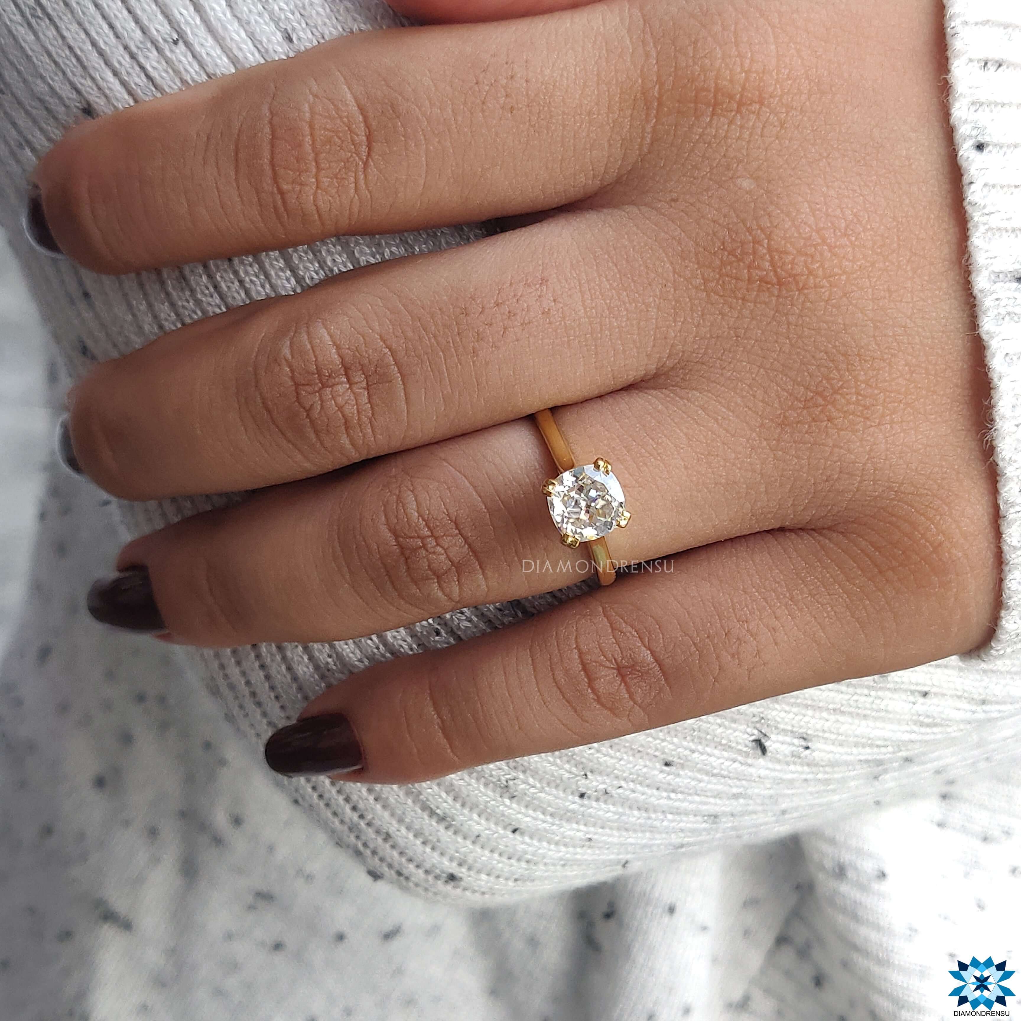 A classic Cushion Cut Engagement Ring with intricate detailing, perfect for a timeless look.
