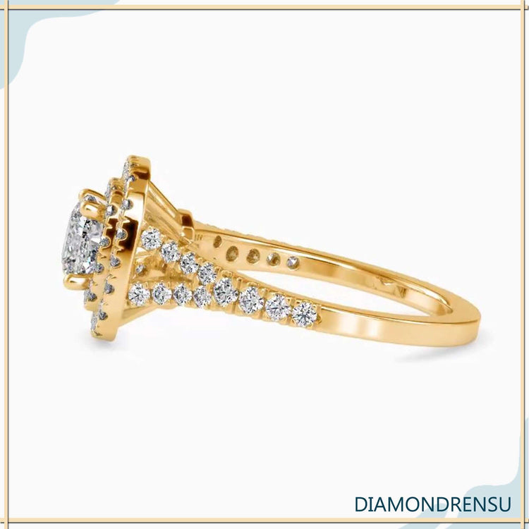 Cushion double halo engagement ring in yellow gold with 4 round prongs.
