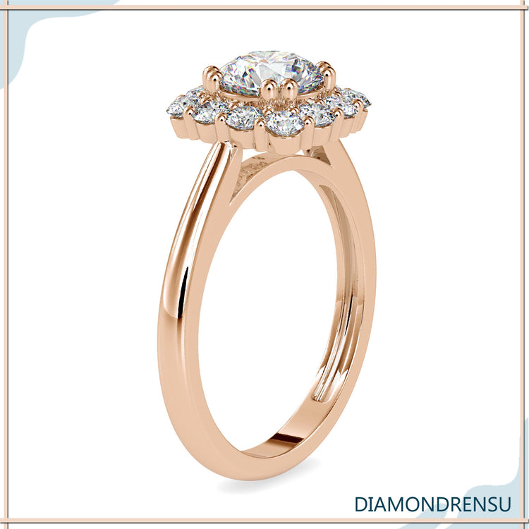 Yellow gold engagement ring featuring a simple round cut diamond
