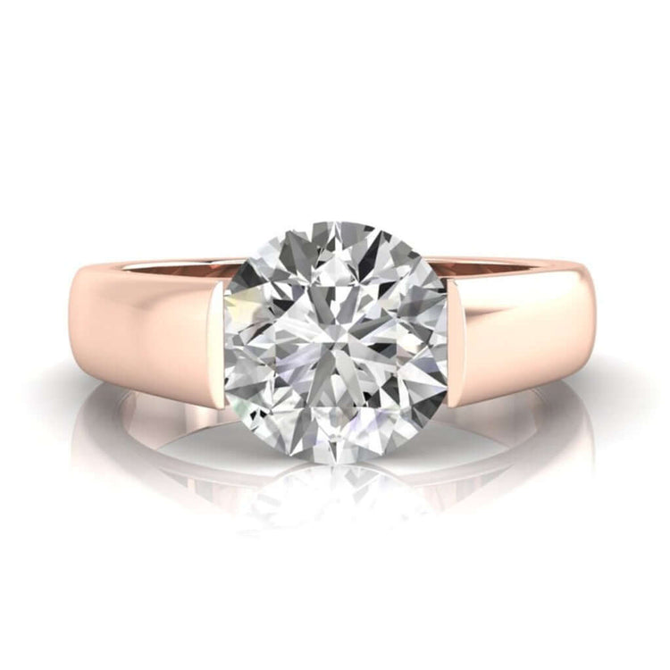 Tension set mens gold wedding band with single round cut diamond.
