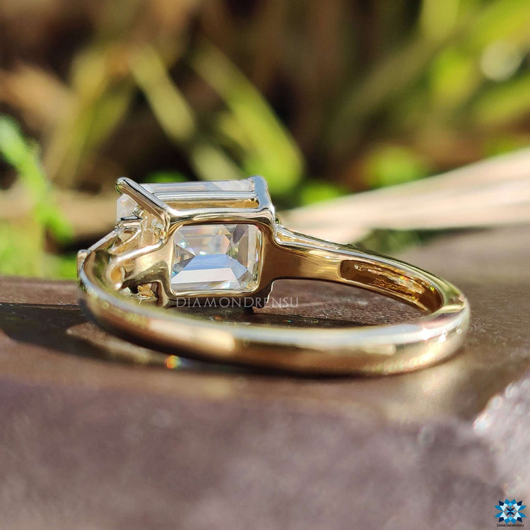 Custom emerald cut engagement ring.
