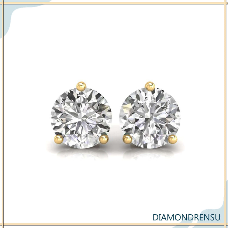 UK diamond earrings in modern 3 prong setting.
