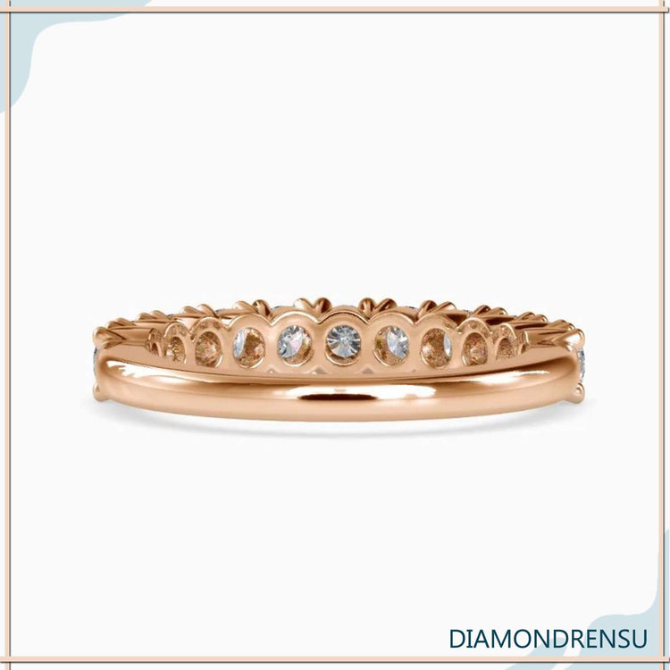 Lab grown diamond wedding band crafted in half eternity style.
