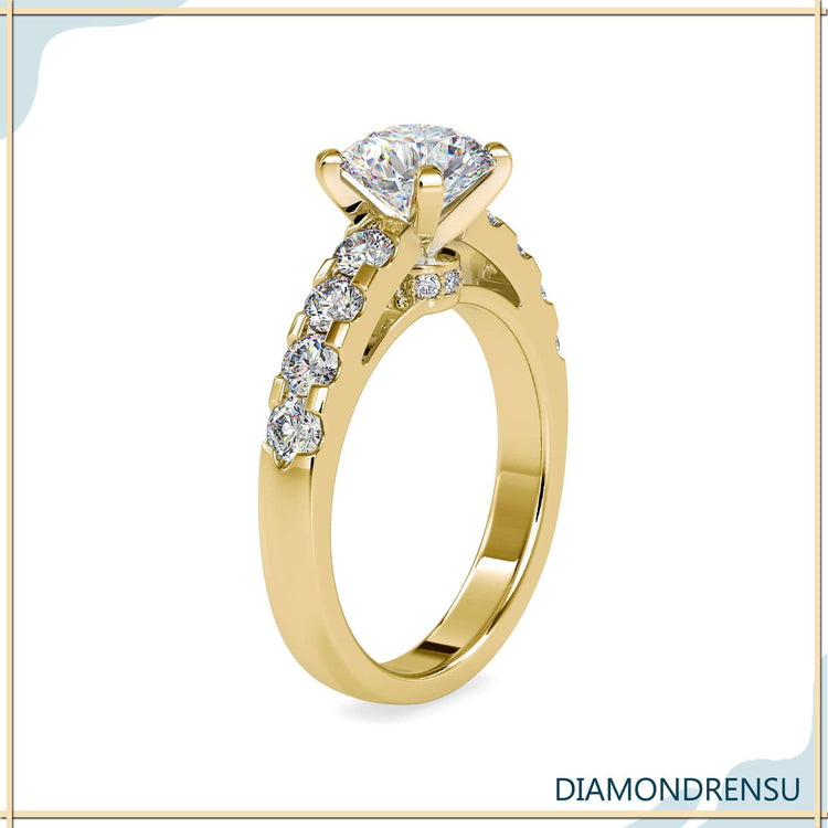 Designer ring with hidden halo and handmade 4 prong style.
