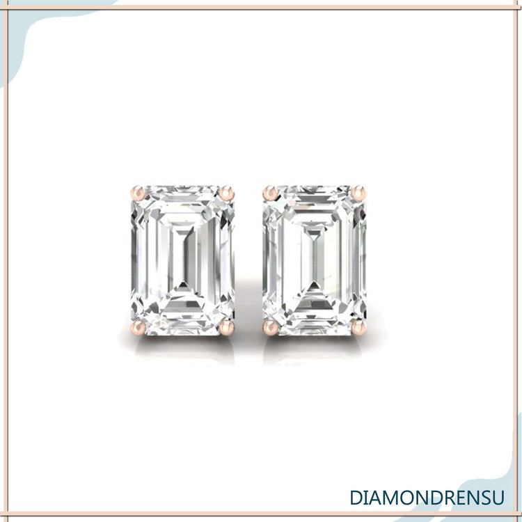 White gold emerald diamond earrings with secure back.

