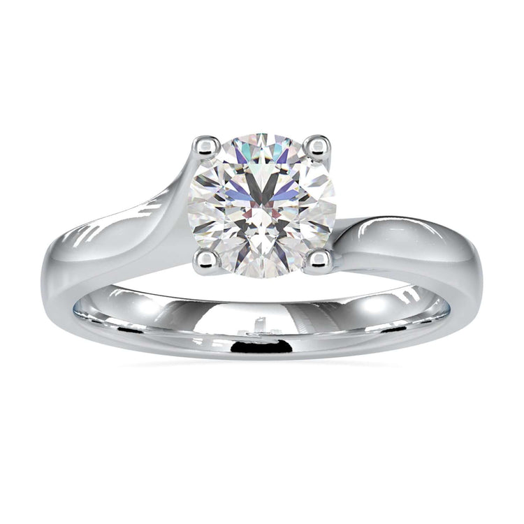 Bypass diamond ring with round cut solitaire centre.
