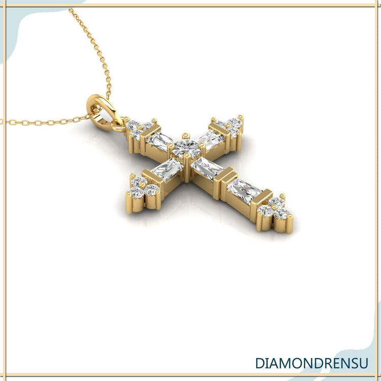 Yellow gold cross pendant with criss cross diamond detail.

