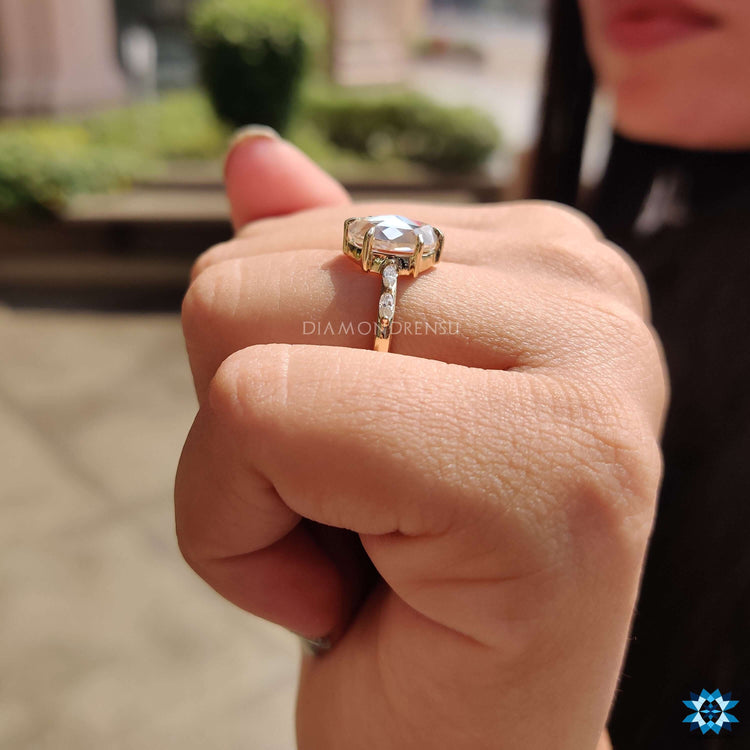 Moissanite engagement ring with unique floating pave style.
