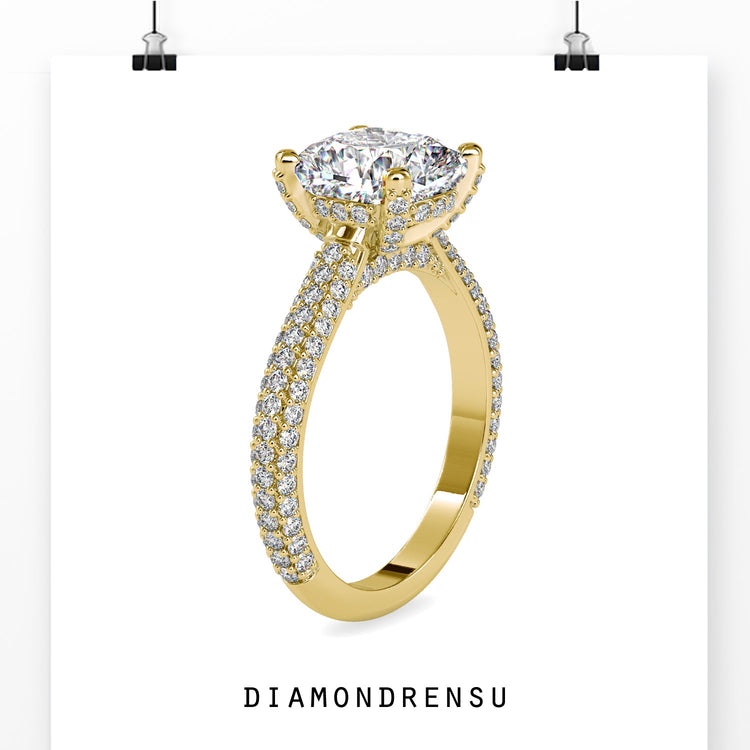 Designer ring in cushion style with pave setting.
