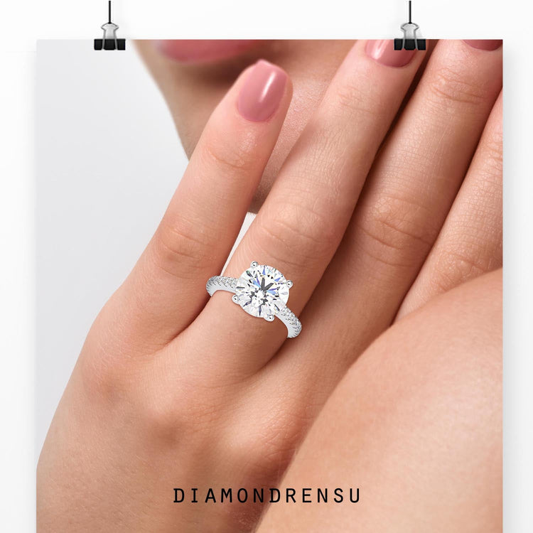 Pavé setting ring featuring small diamonds across the band.
