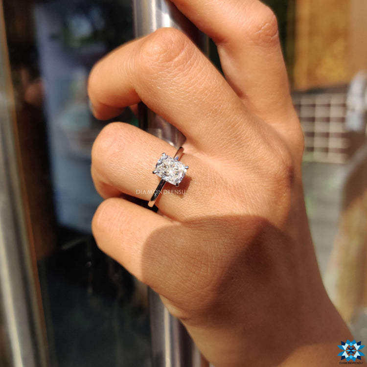 White gold engagement ring with solitaire moissanite.
