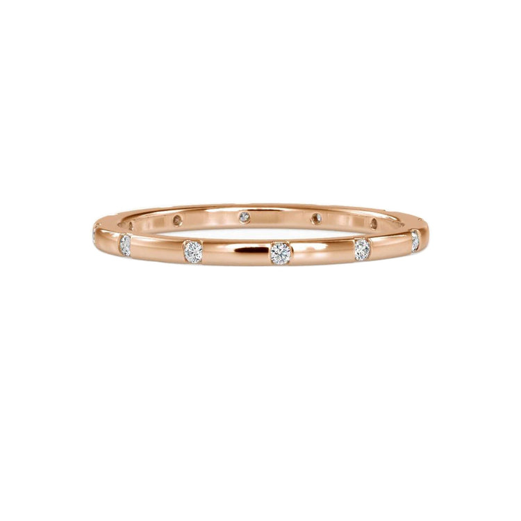 Lab grown diamond eternity ring in a custom setting.
