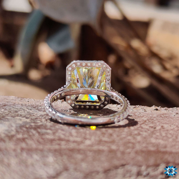 Custom engagement ring featuring a canary radiant moissanite.
