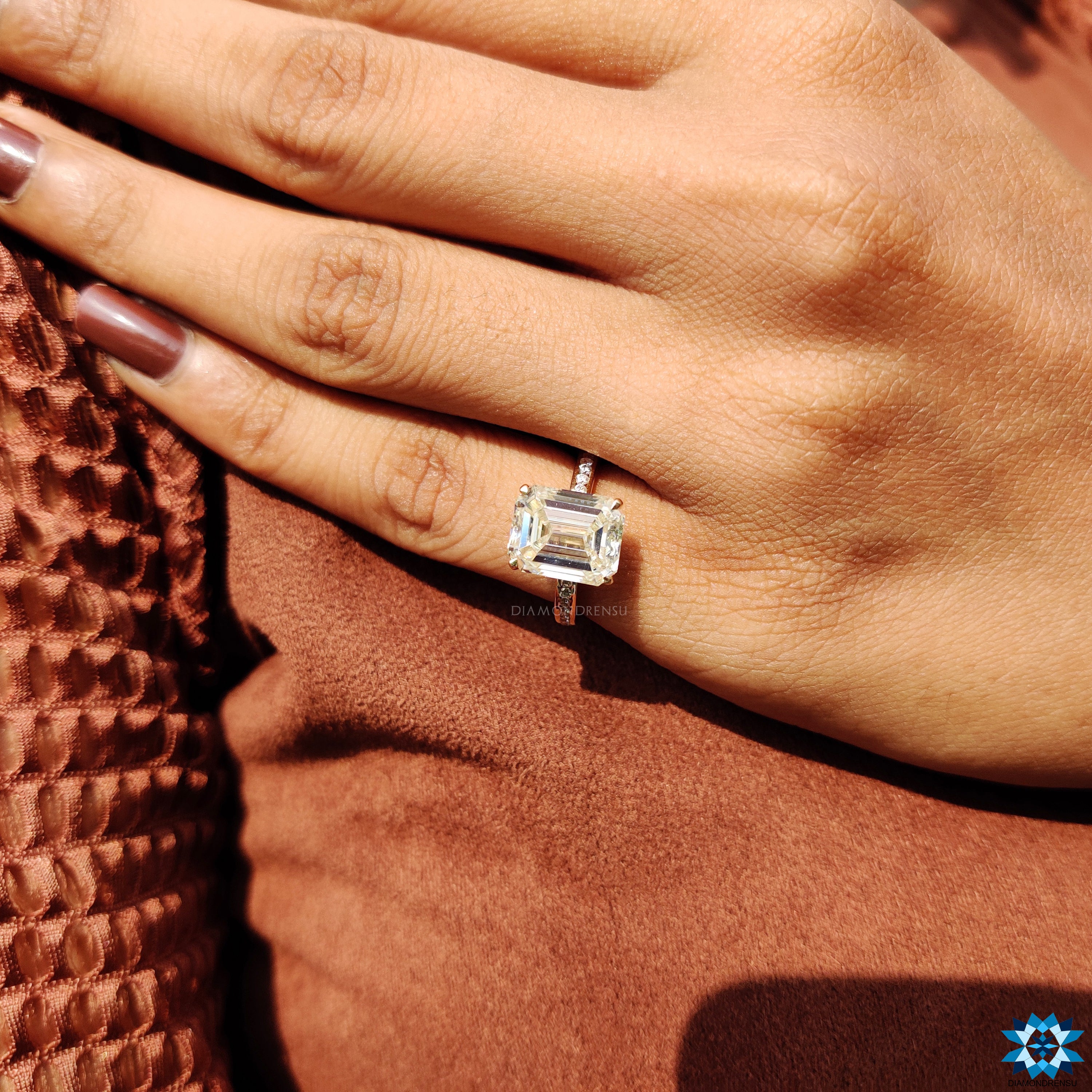 4 prong claw setting ring with light yellow emerald moissanite.
