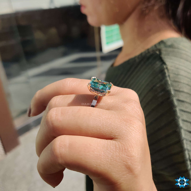 Hidden halo engagement ring with radiant cut center.
