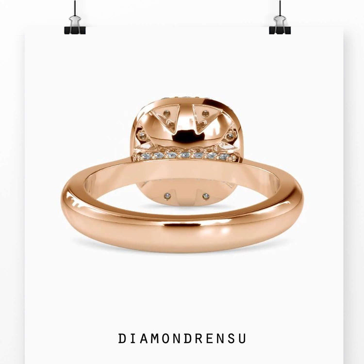 UK diamond ring with custom bridge assent and halo setting.
