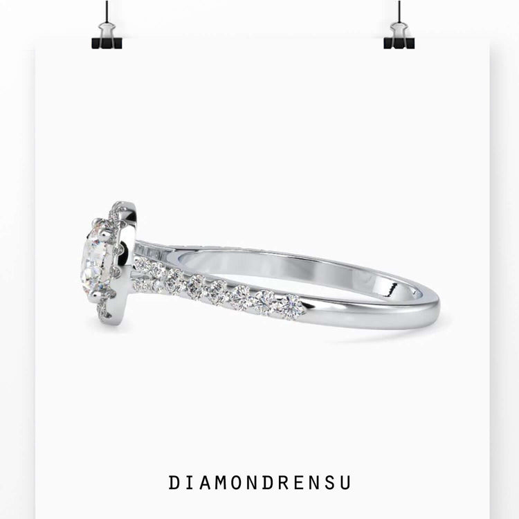 White gold round cut pave engagement ring.
