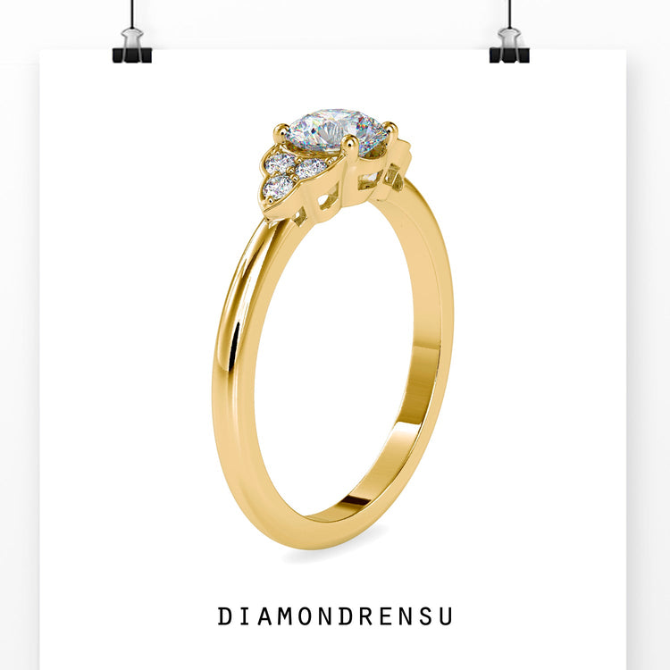 White gold engagement ring with muse style seven diamond design.
