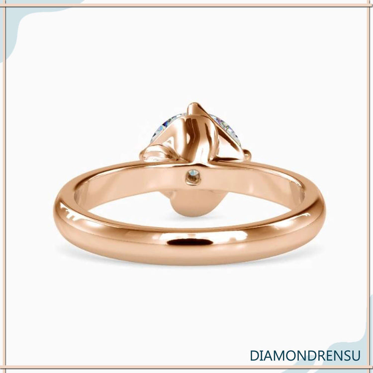 Handmade ring featuring solitaire lab grown diamond.
