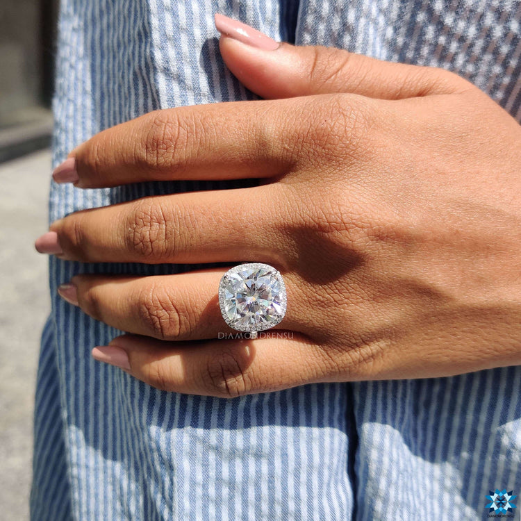 Custom engagement ring with halo and pave design.
