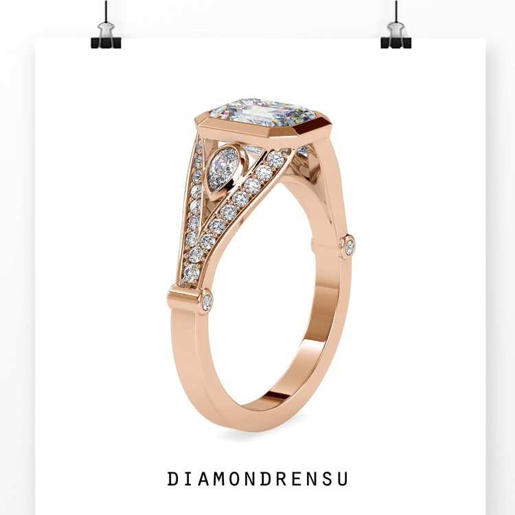 Rose gold engagement ring with handmade three stone layout.
