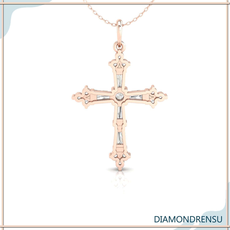 Designer cross pendant in rose gold with bar set detail.
