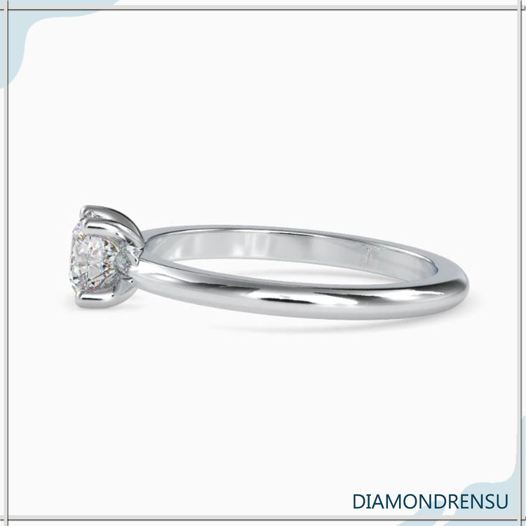Rose gold engagement ring with round cut lab grown diamond.
