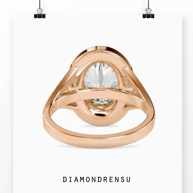 Oval cut centre diamond with tapered baguette accents.
